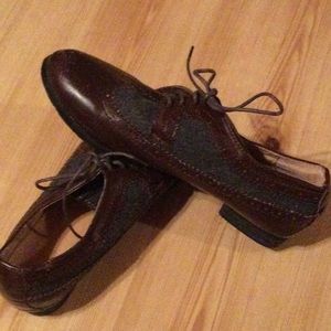 Brown leather and gray wool Oxford shoes. Cool menswear look.